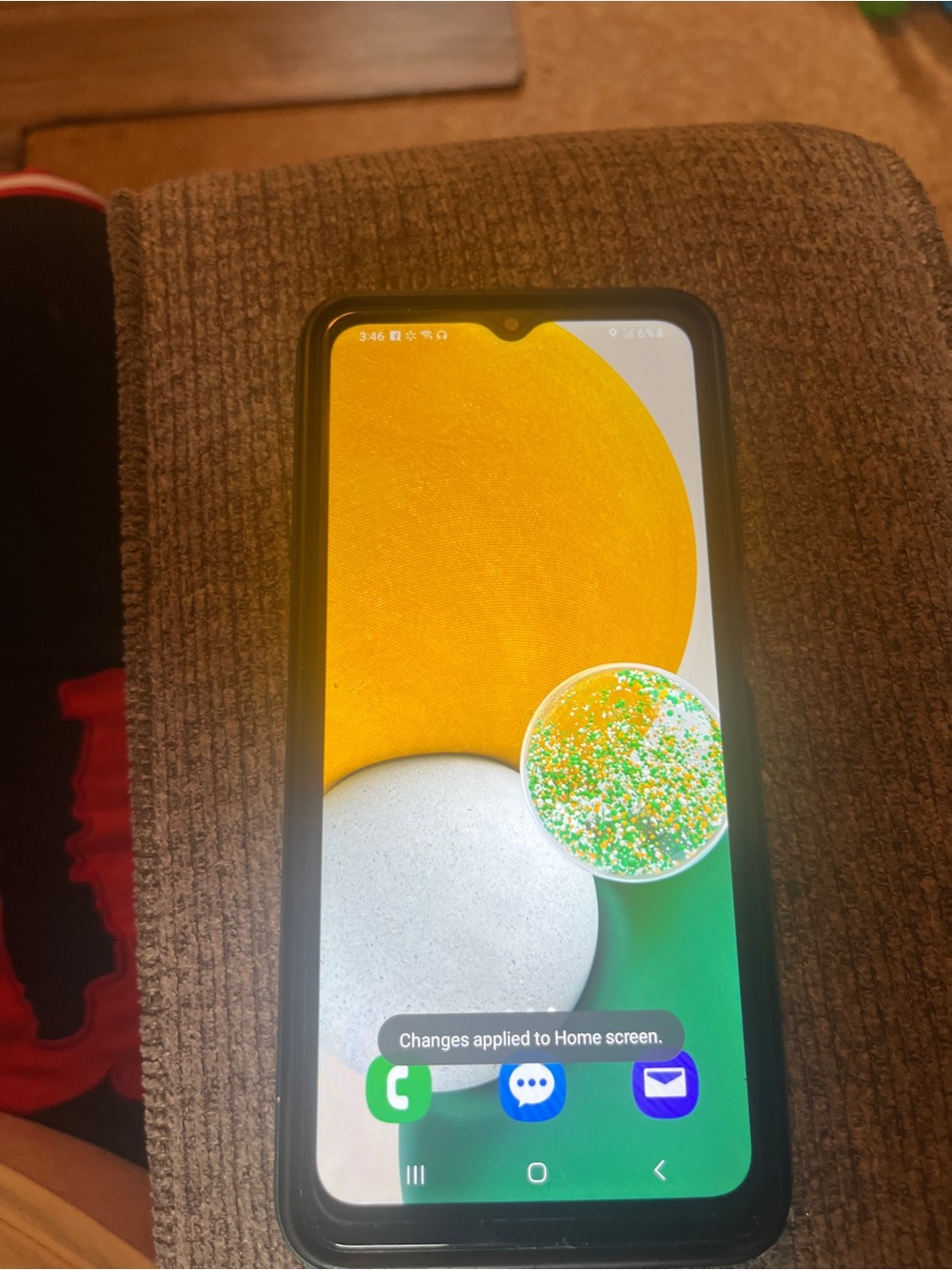 Samsung Black Smartphone with Yellow and Green Display